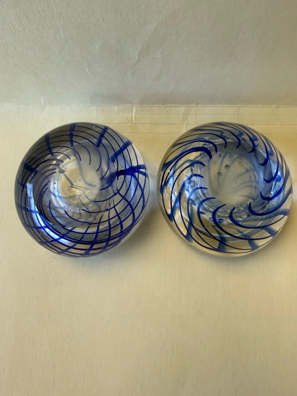 Pair of Handmade Art Glass Paperweight Candle Holders. Clear with Blue Swirl.